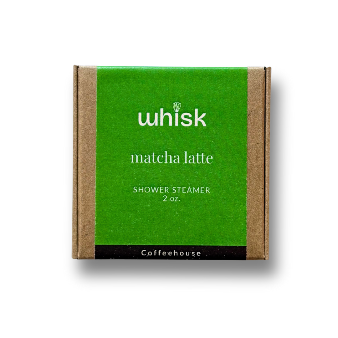 Whisk matcha latte shower steamer on a wooden surface